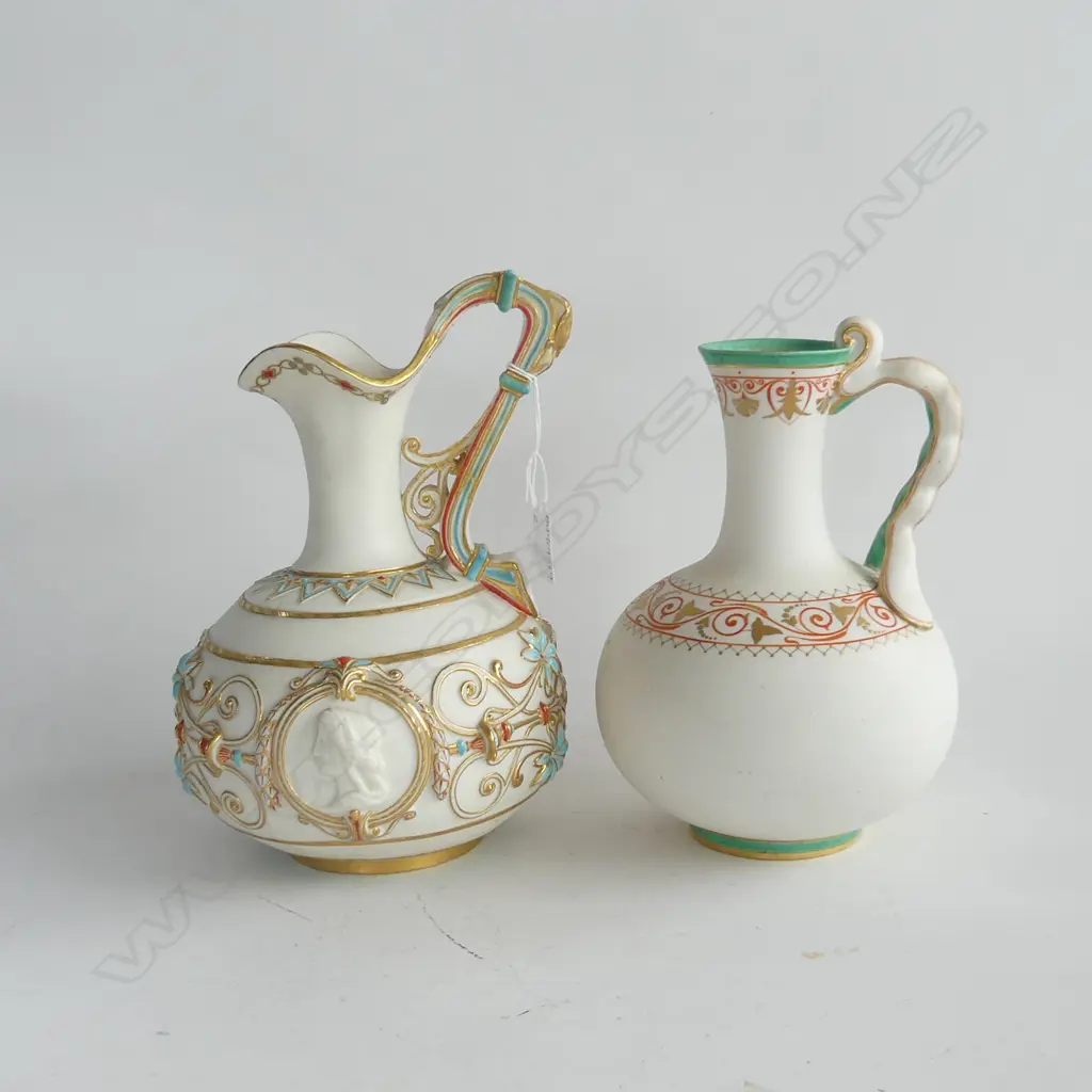 2 VINTAGE JUGS - ORNATE DECORATIONS & HANDLES H.260 & 250mm, MARKS /SIGNATURE(?)TO THE BASE OF LARGER VASE Image 1++