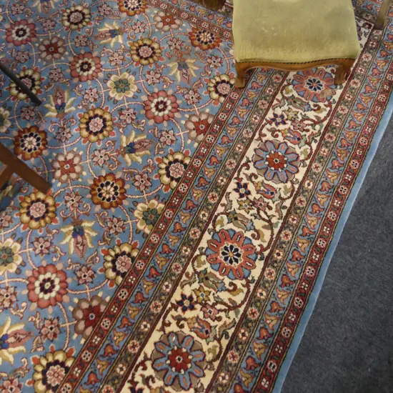 LGE PERSIAN HANDKNOTTED CARPET 4 x 3m. pale blue ground repeat pattern.