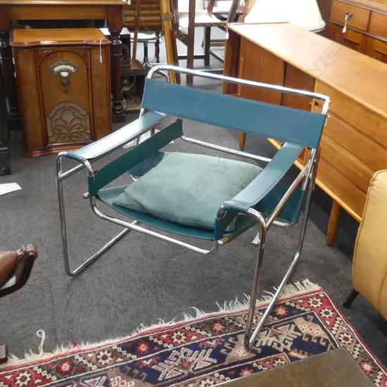 WASSILY CHAIR, GREEN LEATHER. (SLIGHT DAMAGE OT LEATHER)