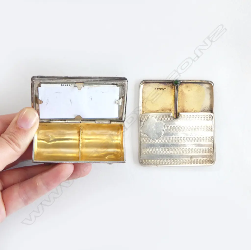 A sterling silver double stamp box and a slender silver stamp pocket case, Image 1++