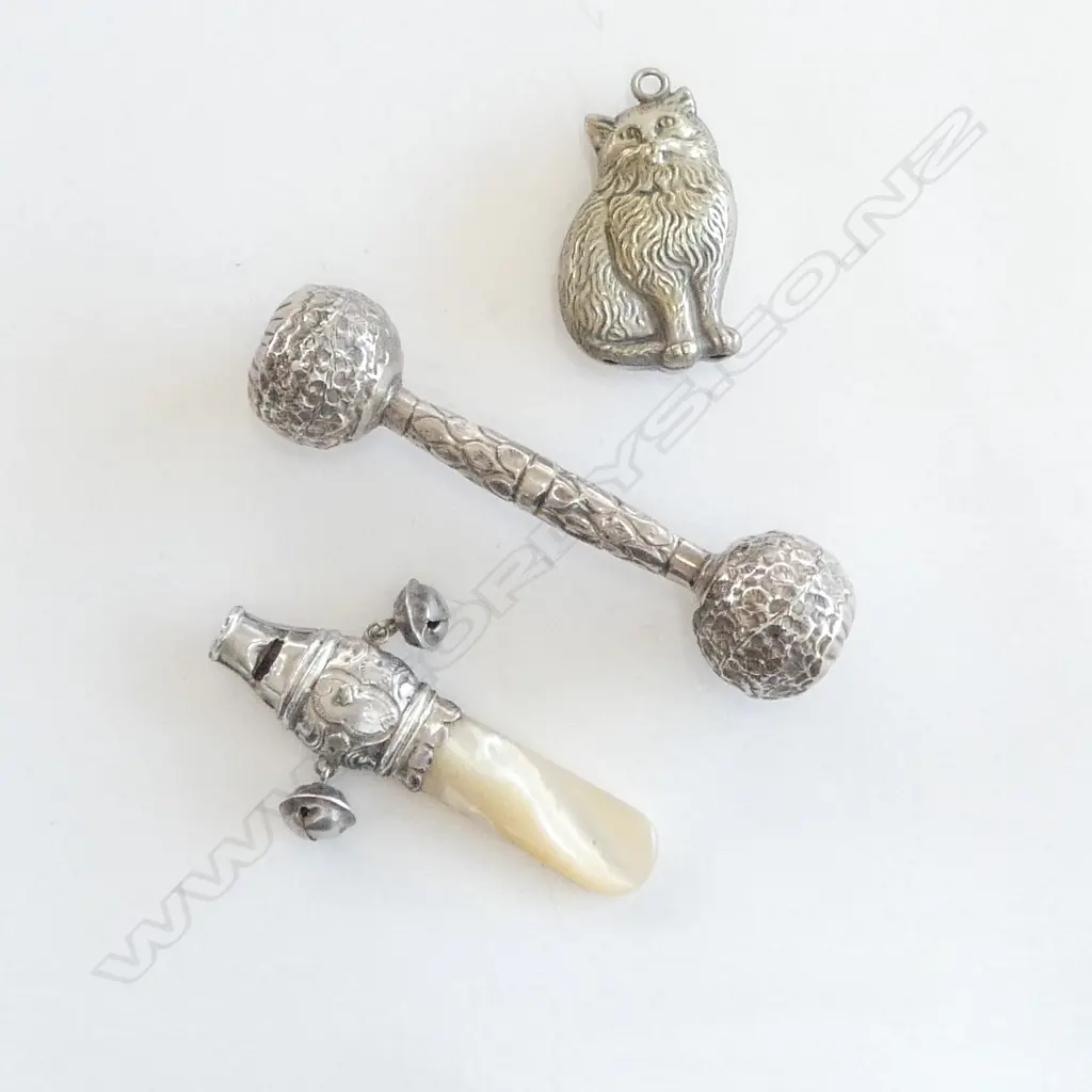 Three silver plated child's rattles, Image 1++
