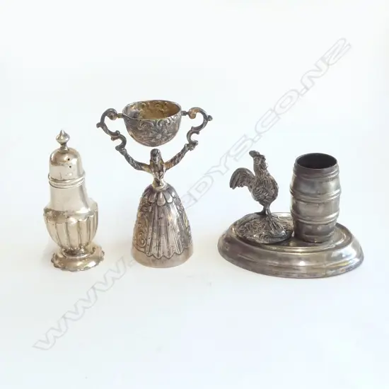 A sterling silver gilt wager cup, a silver pepperette and a plated toothpick stand,