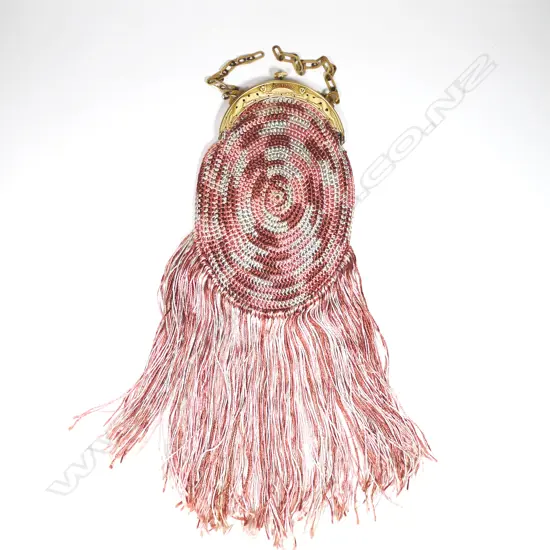 A French Art Deco period crocheted silk handbag with moulded celluloid frame,