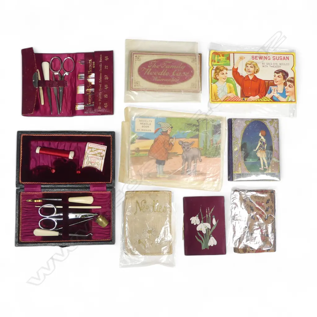 Two lady's sewing compendiums, one leatherette, one red folding purse form along with a selection of decorative needle books and original needle packs Image 1++