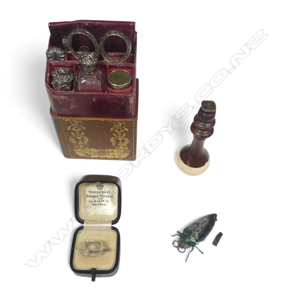 Wm IV period sewing compendium, a jewel beetle, a rosewood and bone handled seal and a loose seal stone. Image 1++