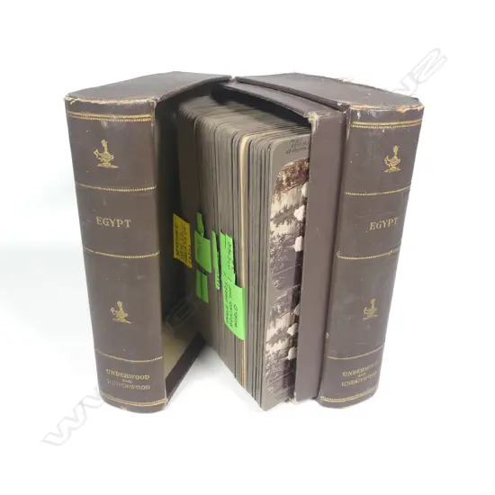 A box containing stereoscope cards disguised as two cloth bound books entitled 'Egypt' published by Underwood and Underwood,