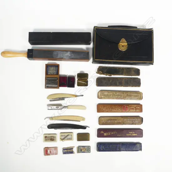A box of cut-throat razors and others, along with a four-side paddle strop