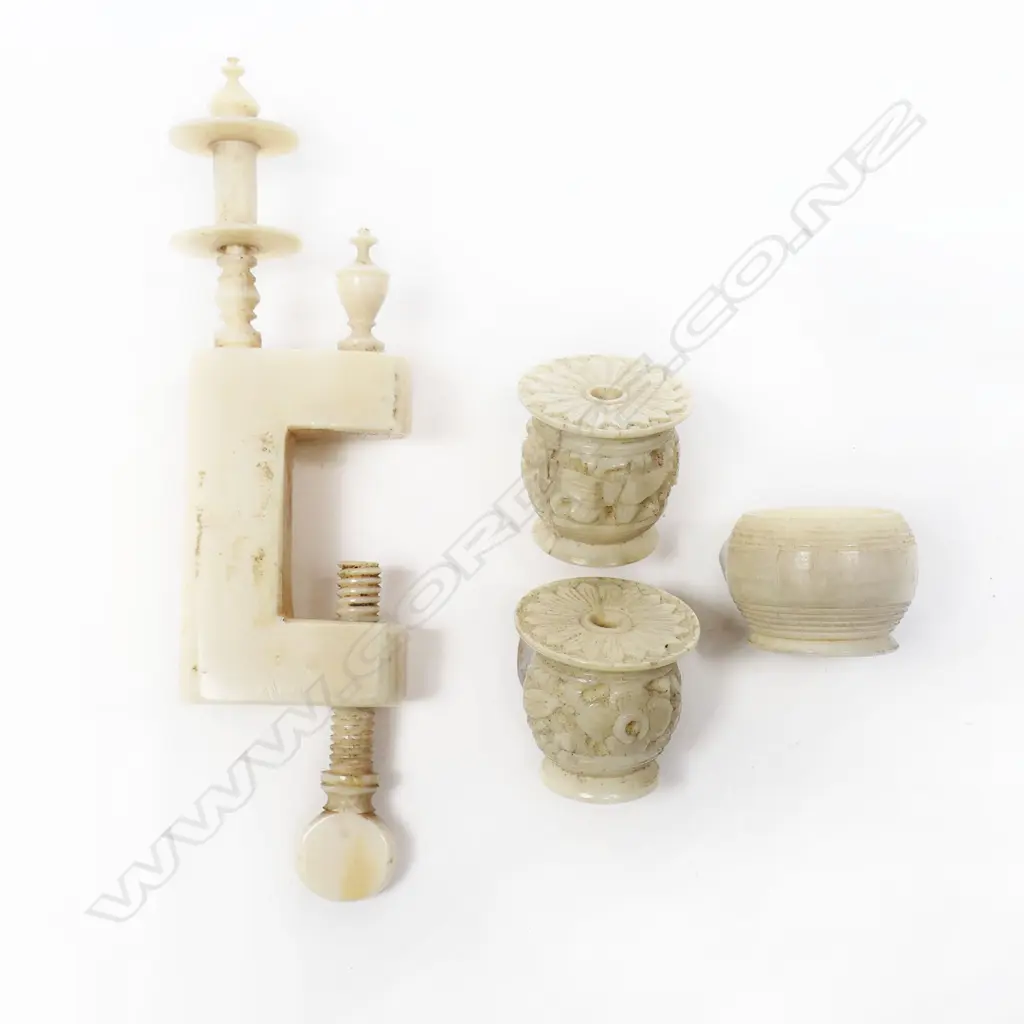 A European plain ivory sewing clamp with bobbin spindle and campana urn finial, along with three small ivory thread holders (parts) Image 1++