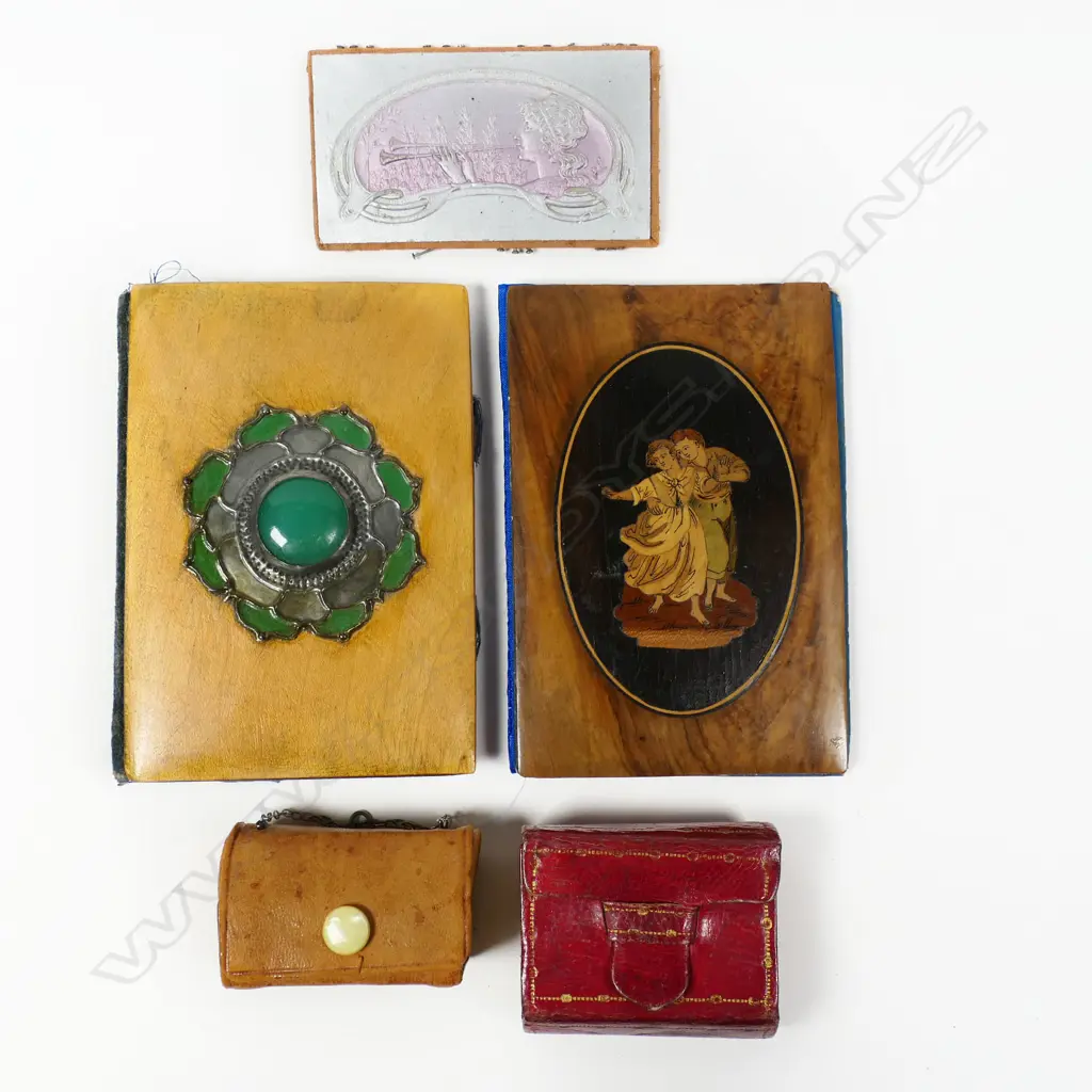 Two fruitwood faced needle books and two miniature leather sewing kits and a Nouveau needle holder, Image 1++