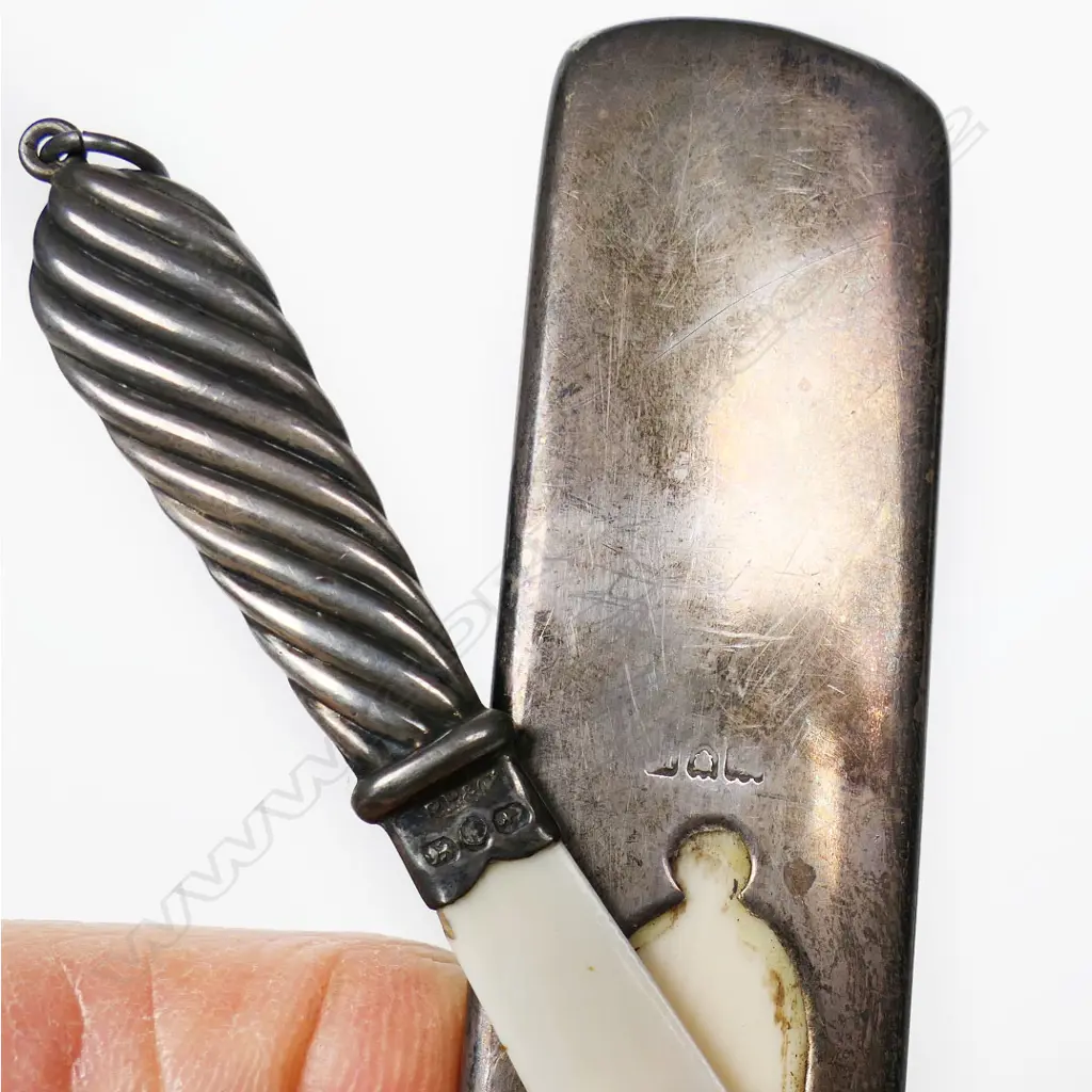 An Ivory dice cup containing a selection of letter knives, hat pins, etc, Image 1++