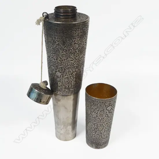 An unmarked, possibly silver, Indian conical flask with fitted beaker,