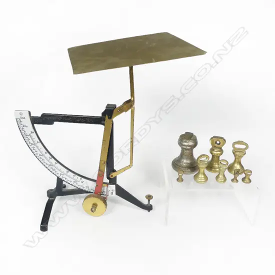 A set of Dutch postal scales (not for trade) and a collection of assorted small bell weights.
