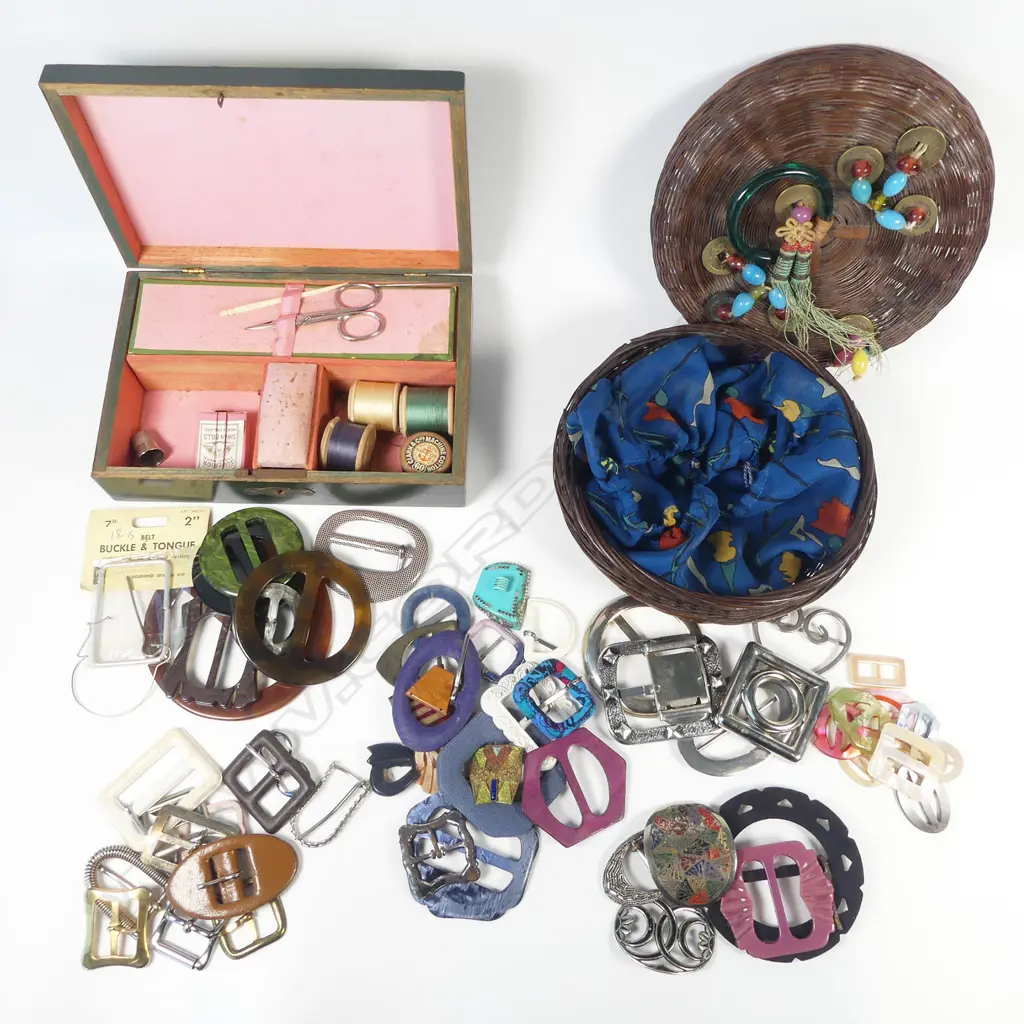 A collection of vintage buckles; a circular cane box adorned with Chinese coins; and a small sewing box with decoupage top. Image 1++