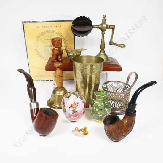 A selection of miscellaneous items, including a handle wound coconut grater.