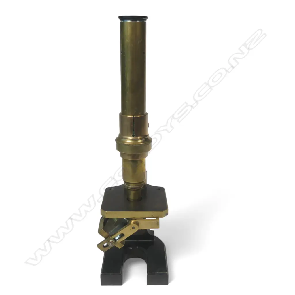 19thC brass monocular compound microscope, the tube marked England 3745, fixed table with adjustable mirror, on lacquered spur shaped foot. Image 1++