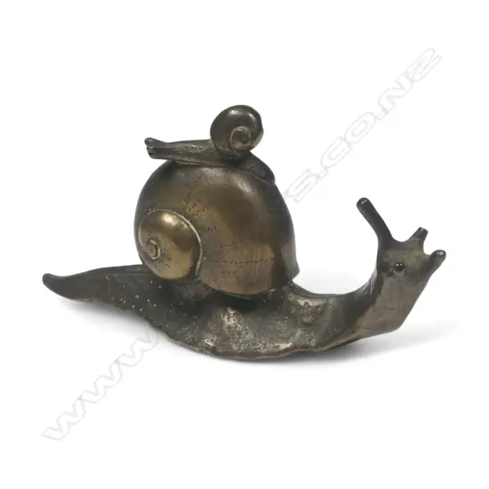 A life size bronze snail sculpture, a baby snail riding on the larger shell. L.85mm