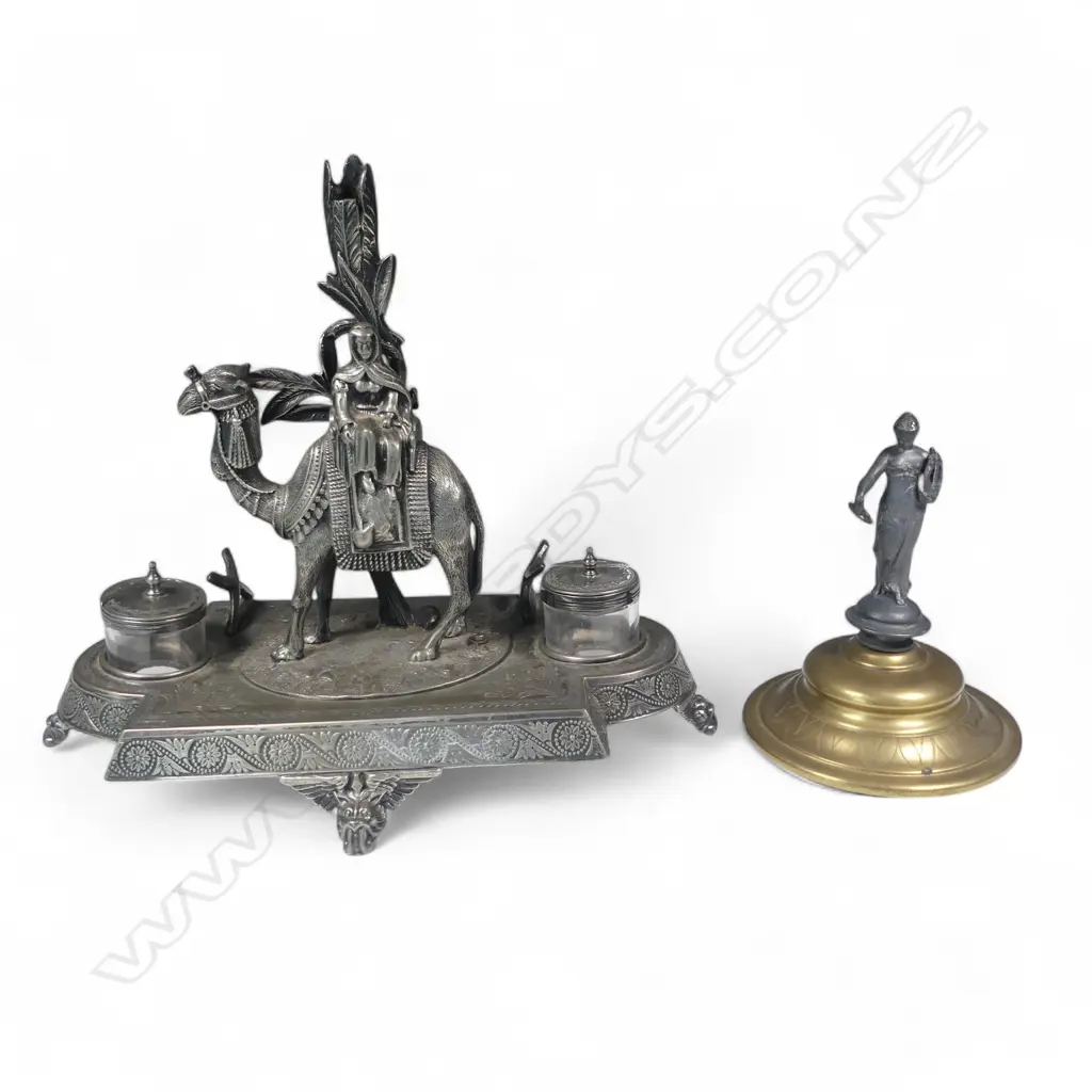 A James Deakin & Sons silver-plated desk top inkstand, surmounted by a camel and cameleer, Image 1++
