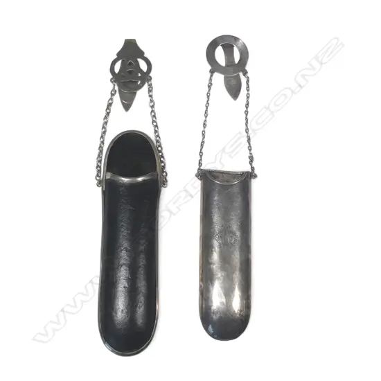 Two spectacle chatelaines, one sliver plate with sterling silver hanger, the other black leather with plated hanger