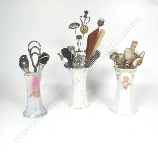 Three porcelain hat pin stands and collection of hat pins