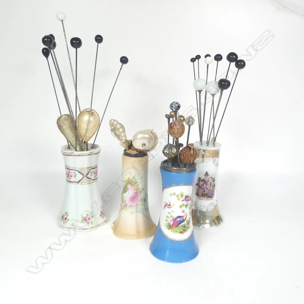 Four porcelain hat pin stands and collection of hat pins Image 1++