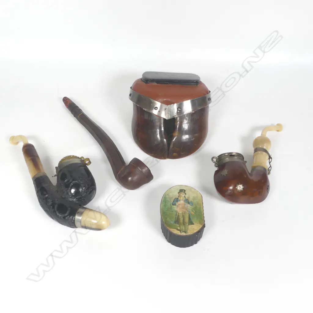 Two European tobacco pipes, a ceramic tobacco pipe, a snuff box mounted to an ox's hoof, and a small decoupage topped snuff box. Image 1++