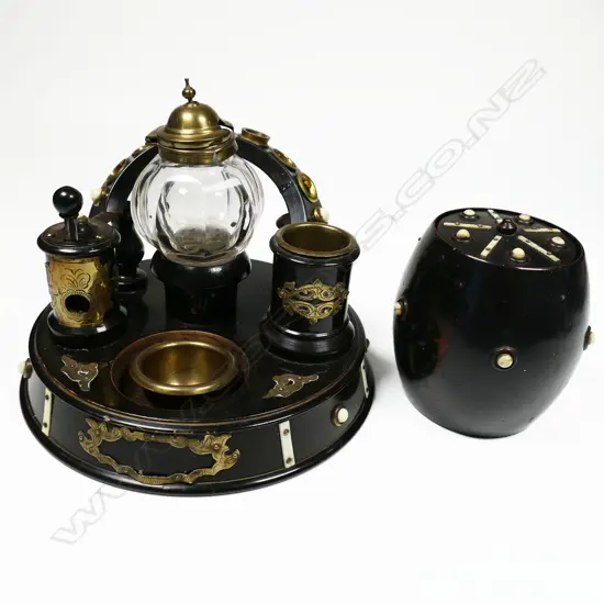 A treen smoker's stand incorporating a glass snuff bottle, and a tobacco barrel with conforming decoration. Stand Dia.180mm