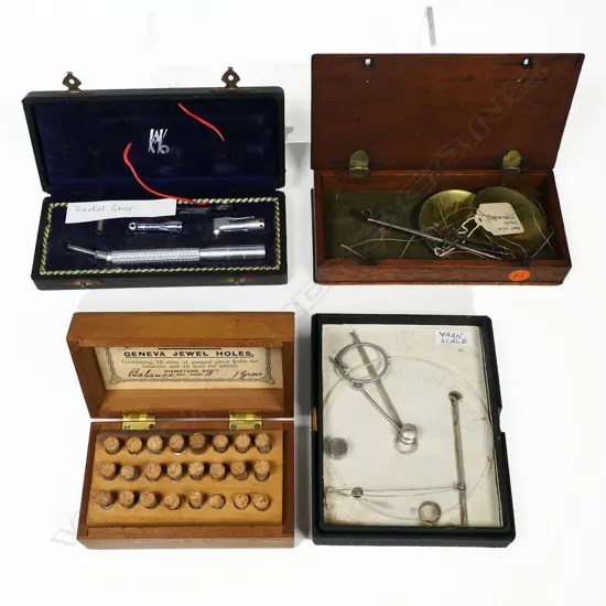 A balance scale, a yarn scale, a dental drill handpick and a set of watch part phials, all in boxes.