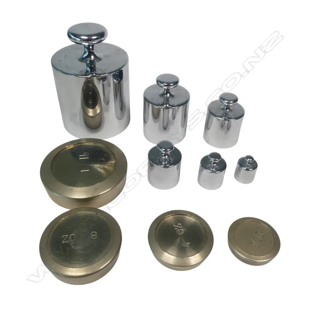 A set of six chrome cylinder weights and a four pan weights 2oz-1lb Image 1++