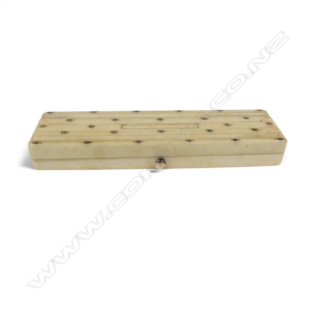 A 19thC ivory toothpick case, rectangular shape, the hinged lid with fluted top inlaid with minute gold florets, Image 1++