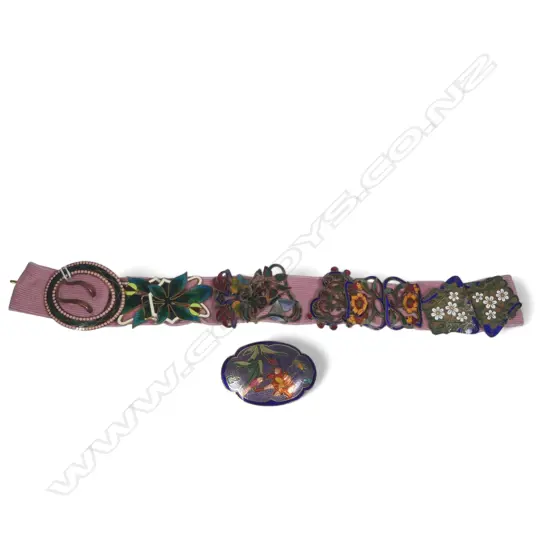 Three two-piece enamel sash belt buckles, Edwardian period and later; along with three half buckles, an oval buckle and an enamel plaque.