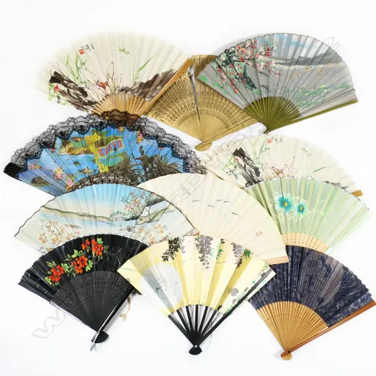 A collection of folding paper and other fans