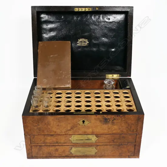 A 19thC homeopathic apothecary box with two fitted drawers,