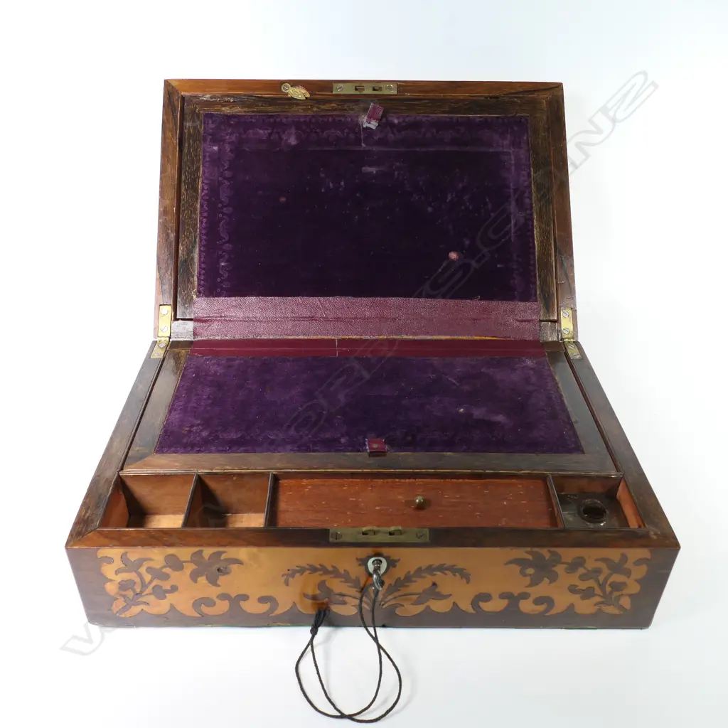 A Victorian birds eye maple and rosewood marquetry veneered workbox, with a symmetrical floral silhouette pattern. With key. 350 x 235 x 120mm Image 1++