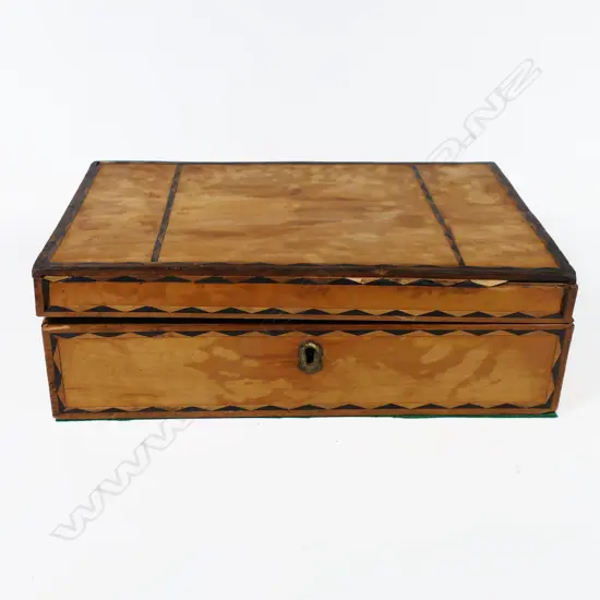 A small workbox, with multiple lidded compartments, most tortoiseshell veneer missing. 250 x 170 x 80mm