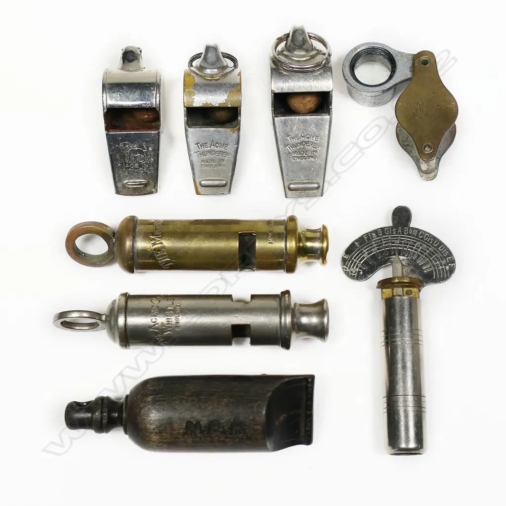 North Eastern Railway horn guard's whistle; two English Acme 'police' whistles (post 1930s); three referee's whistles; variable pitch pipe and a folding magnifying glass. Image 1++