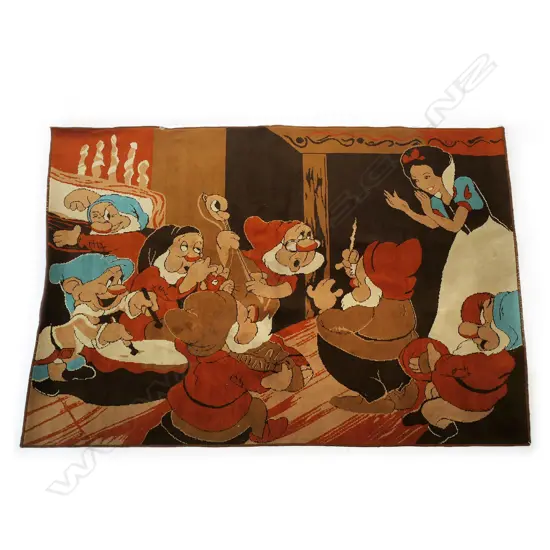 A Walt Disney floor rug featuring Snow White and the Seven Dwarfs