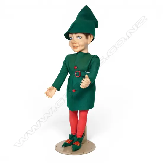 A large vintage standing pointy-headed elf figure on stand,