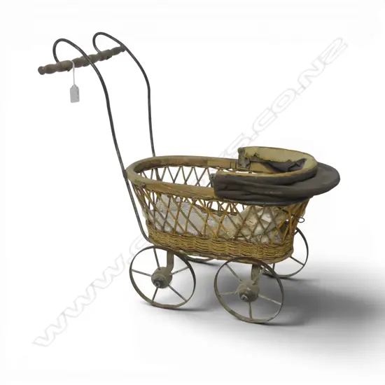 A small antique wicker doll's pram