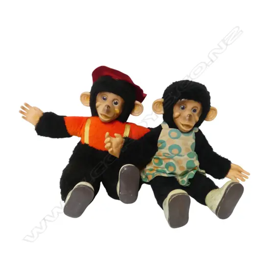 Two similar vintage soft toy tagged monkeys,