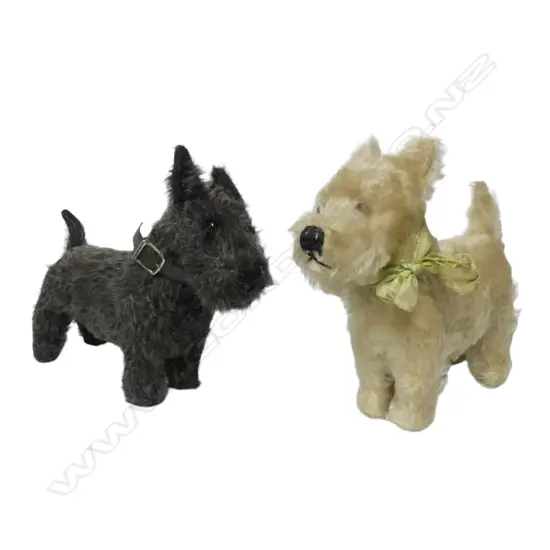Two vintage tagged Chad Valley soft toy dogs,
