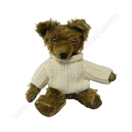 Early 20thC dark green mohair small teddy bear,