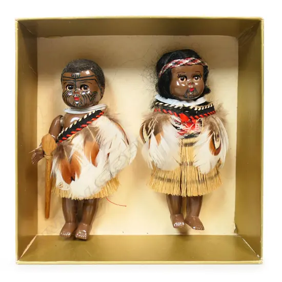 A pair of vintage Māori hard plastic small dolls,