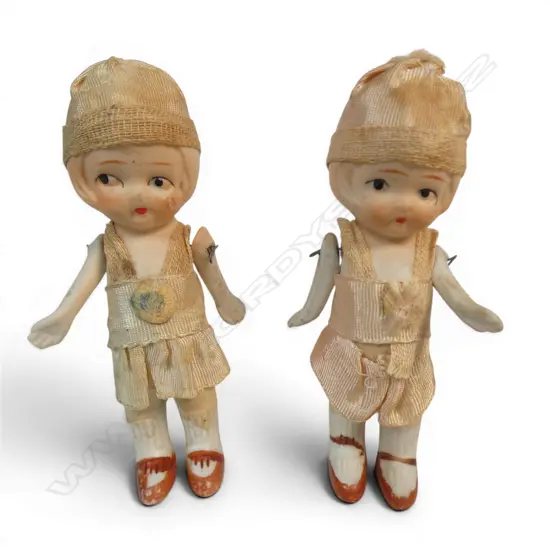Two matching vintage china small flapper dolls,