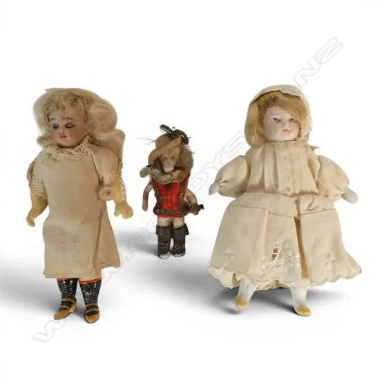 Three early 20thC china small dolls,