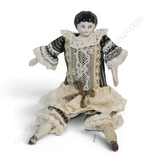 An early 20thC china doll,