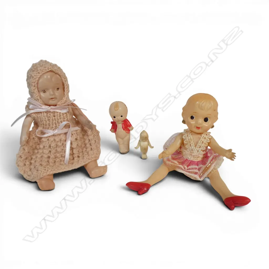Three vintage small celluloid dolls and one mini carved bone, Image 1++