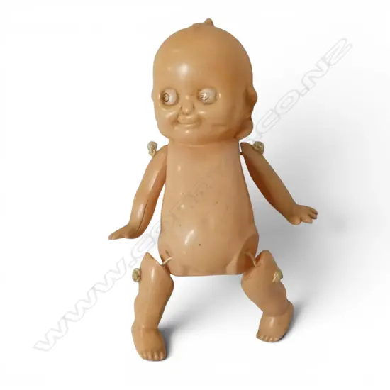 Miniature 6 inch Kewpie doll with wings on back,