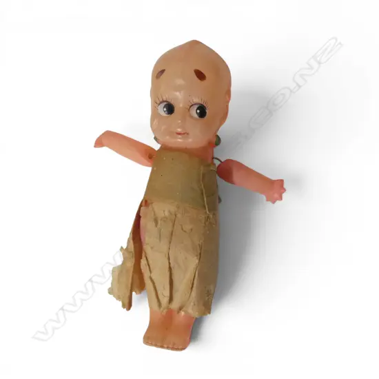 Miniature Kewpie doll with wings on back,