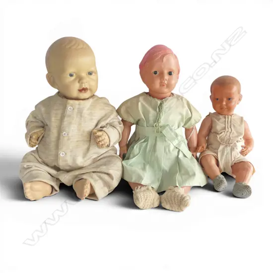 Three vintage plastic dolls
