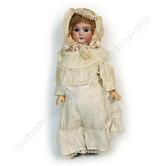 German wind-up walking doll with key,